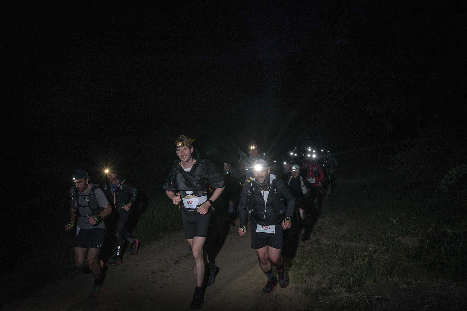 me still smiling somewhere in the middle of the night, with the trail lit only by headlamps