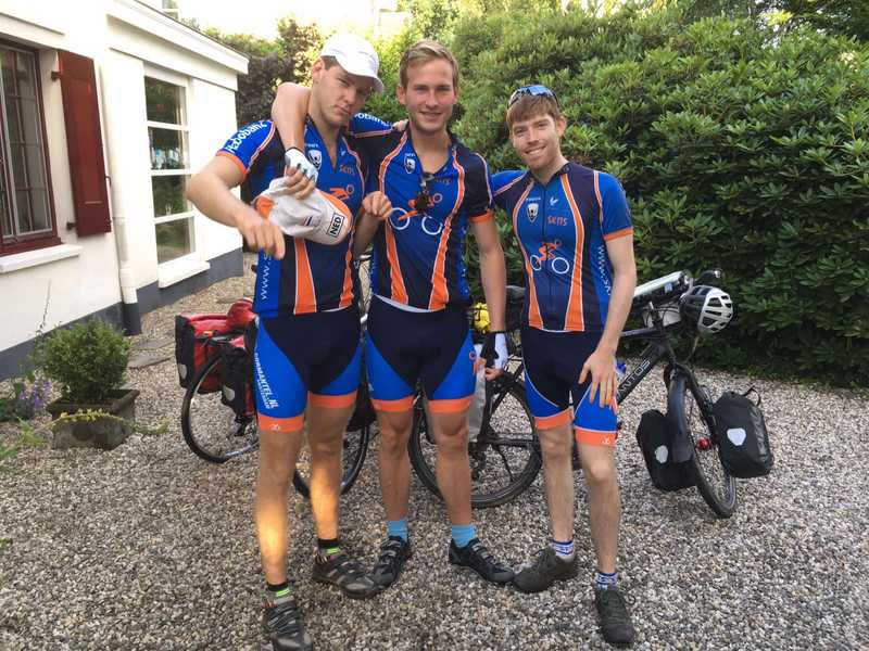 the three of us in front of our loaded bikes just before leaving Maastricht